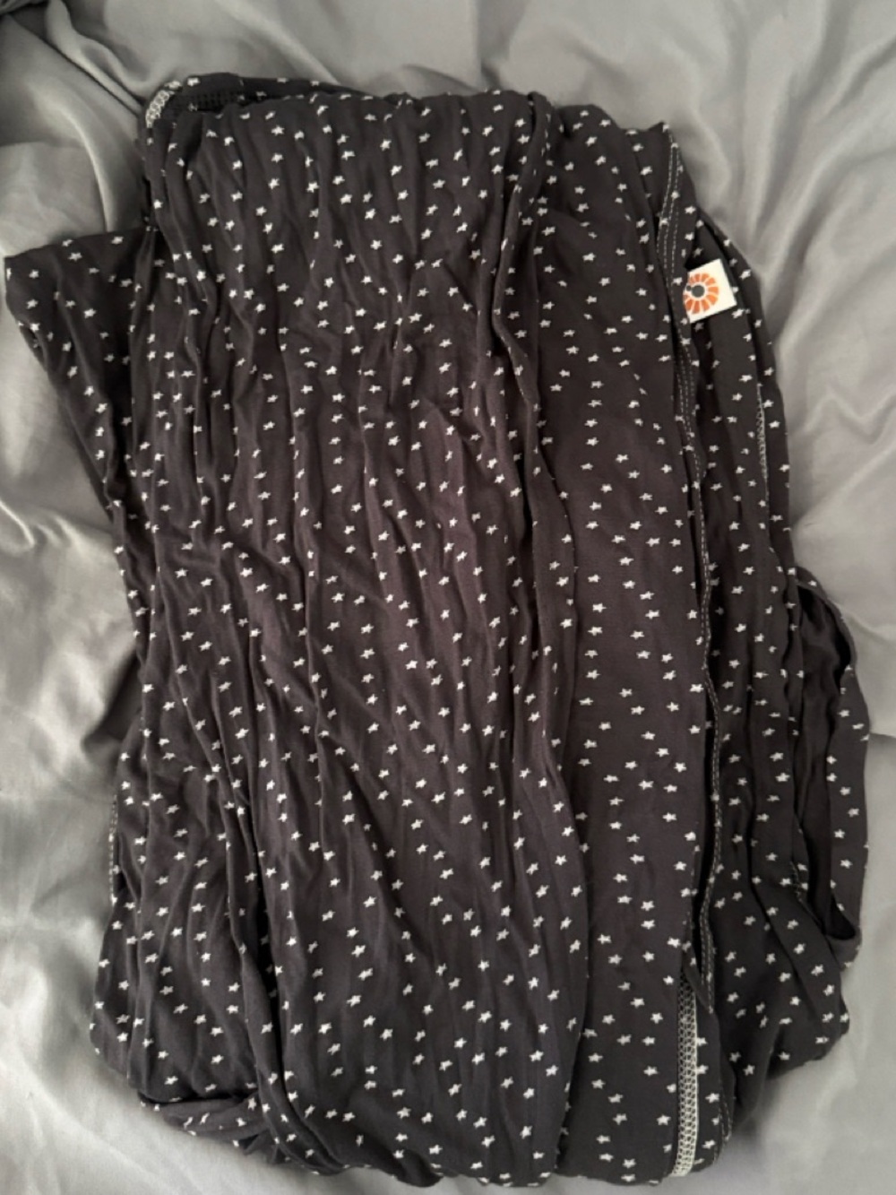 Ergobaby Aura Wrap carrier in Grey with White Stars